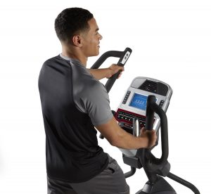 up close picture of a man on the Sole Fitness E35 Elliptical Machine