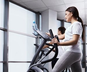 image of a lady working out on elliptical