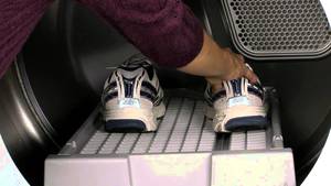 shoes being placed in dryer