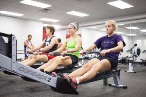 gym bunnies rowing in a group